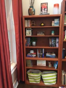 staging a bookcase decluttering