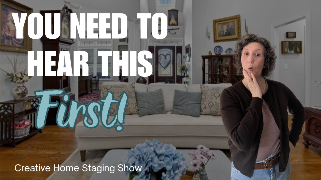 Kasia McDaniel, host of Creative Home Staging Show, is wearing a blue sweater with her hands by her head as if hiding. The background shows a teal painted dining room.